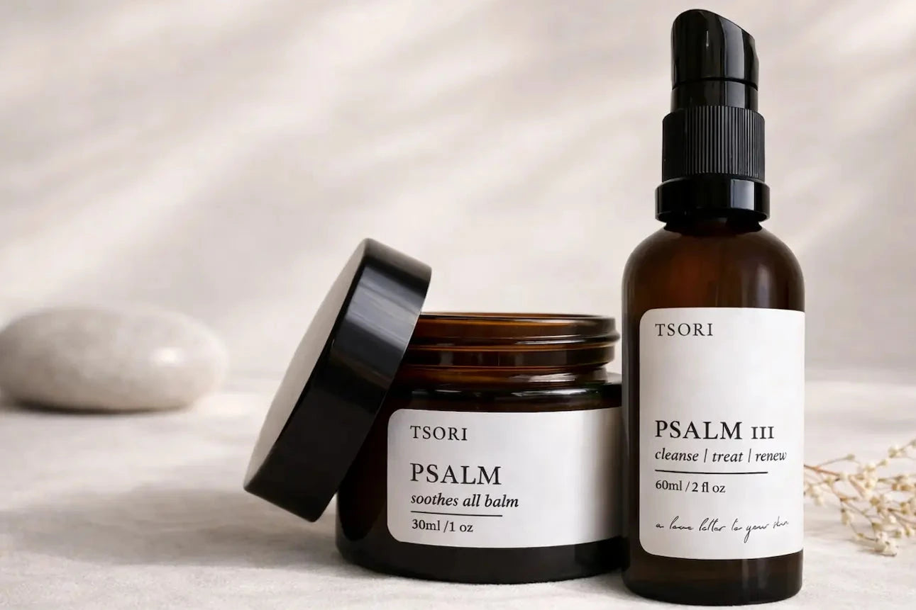 Two bottles of Tsori 'Psalm' skincare products on a neutral background